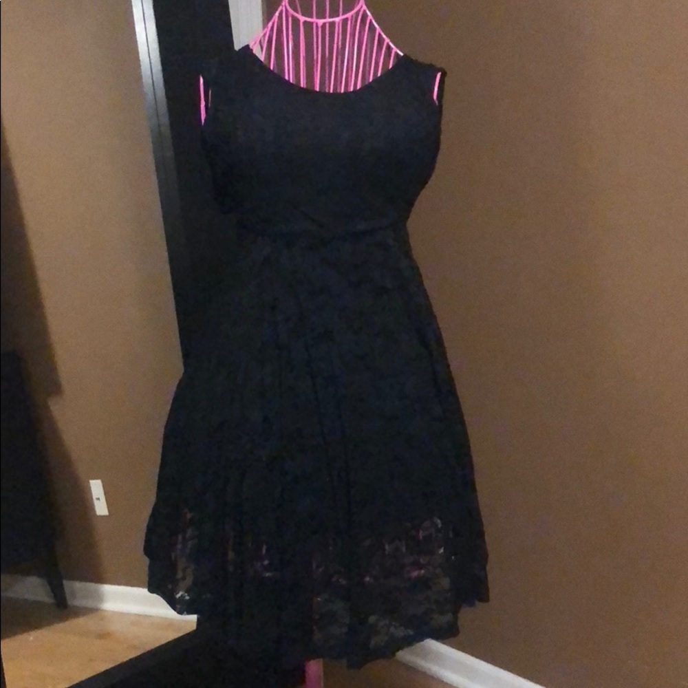 Scoop neck, cap sleeve, low back lace dress